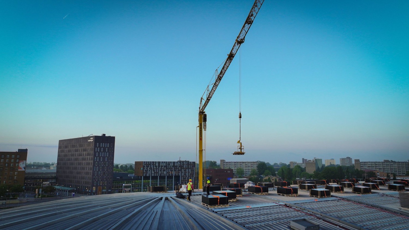 Optisport Dordrecht curved-roof solar installation