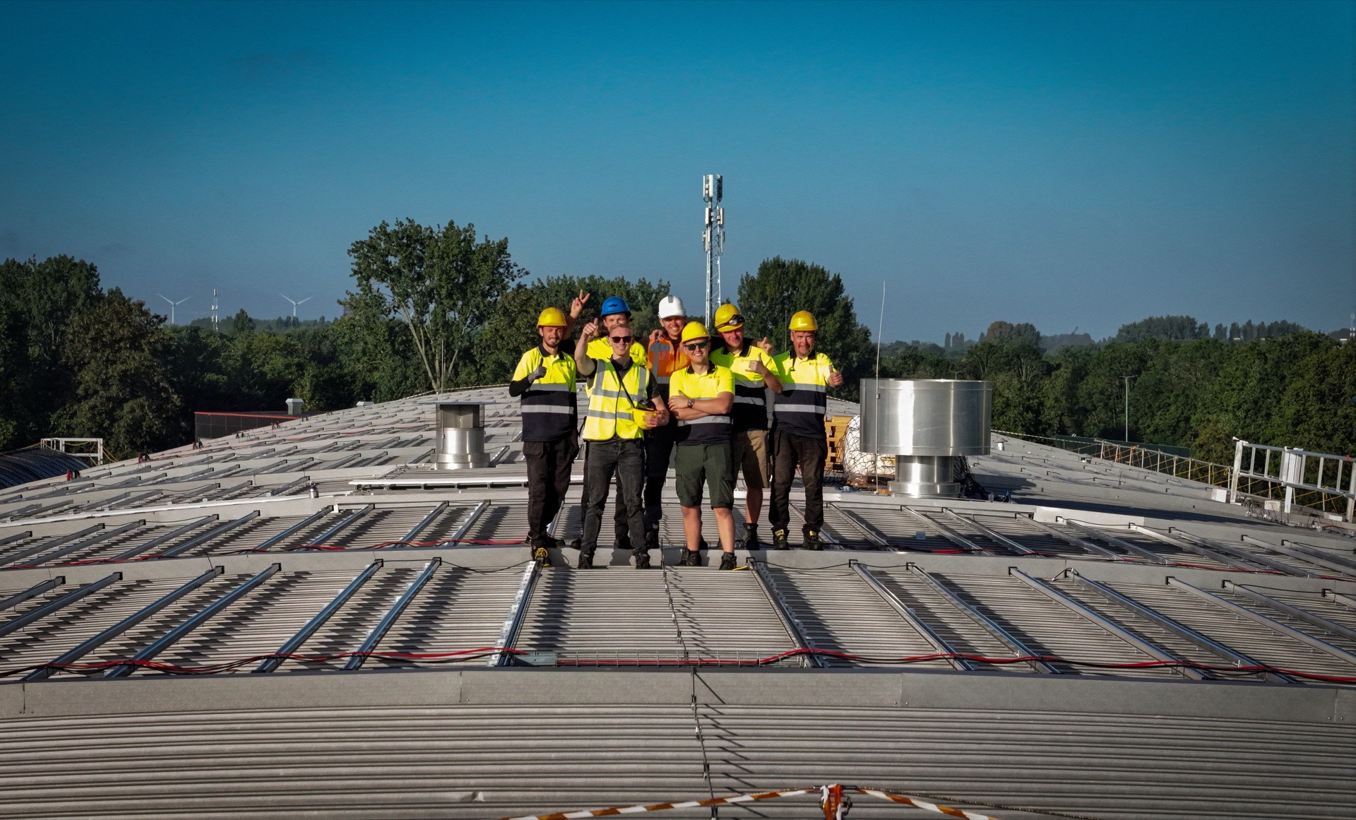 The Green Teams Europe crew on a completed rooftop installation